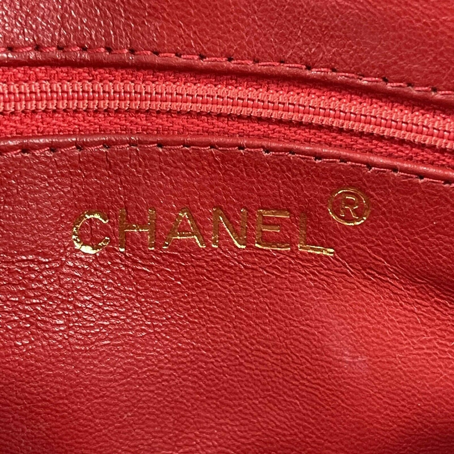 CHANEL - Vintage Quilted Leather CC Oval Red / Gold Tassel Clutch